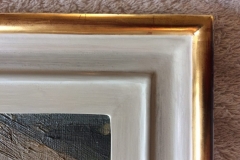 Red gold over a red bole and distressed.  Painted gesso, colours built up to reflect painting -
